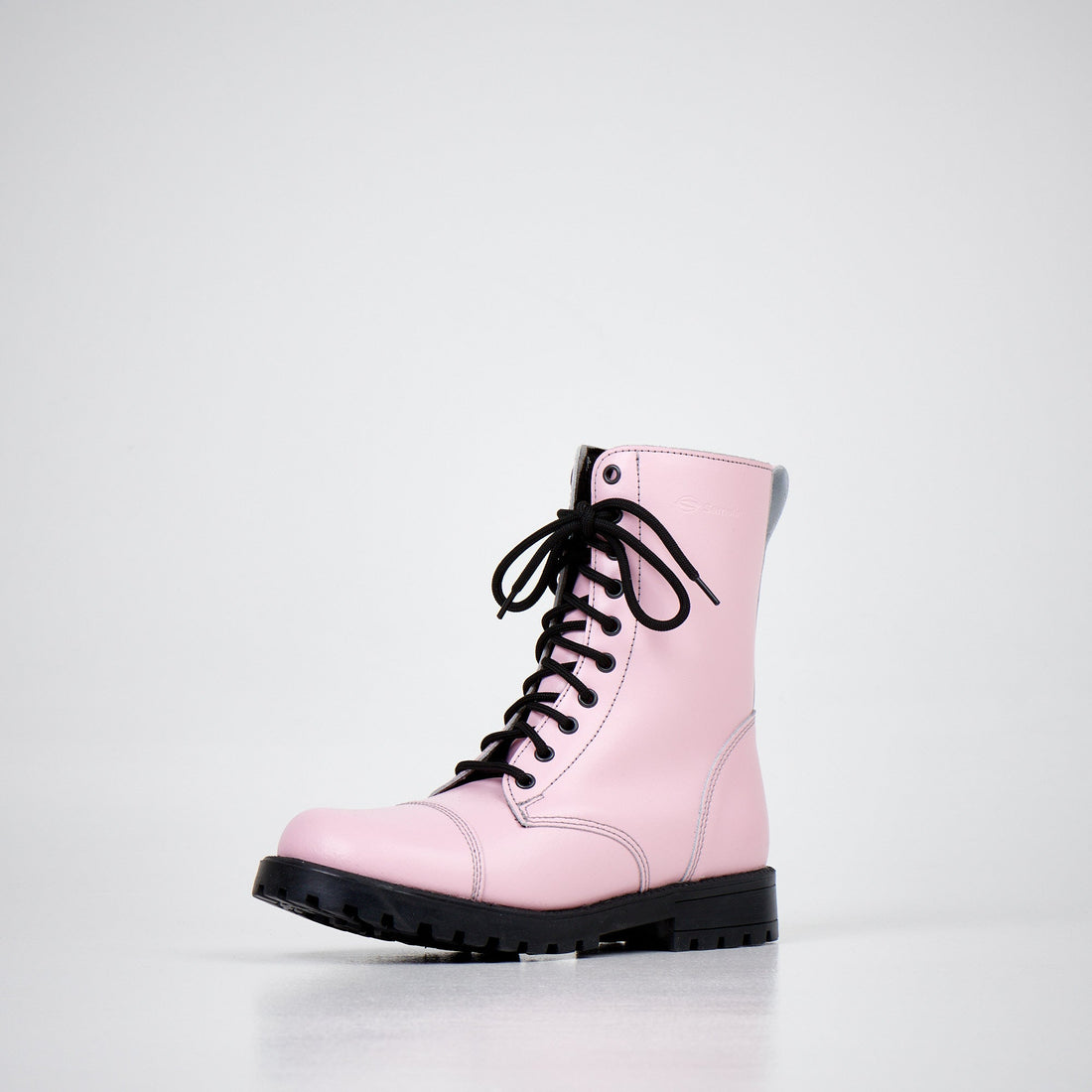 511 Pink Leather Boots: Military Heritage Meets Bold Expression