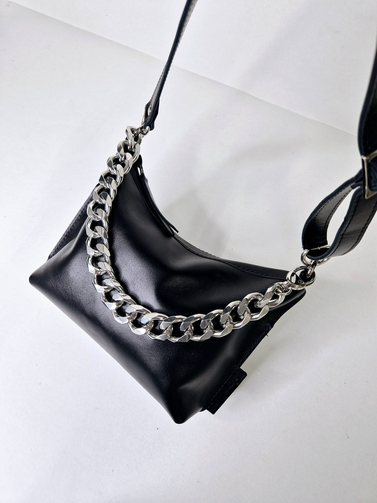 Zelma Kraft small black leather hobo bag with metallic accents