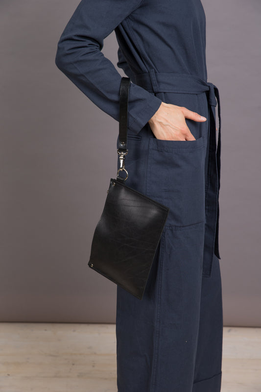 PYKOK Nina black leather clutch with wrist strap