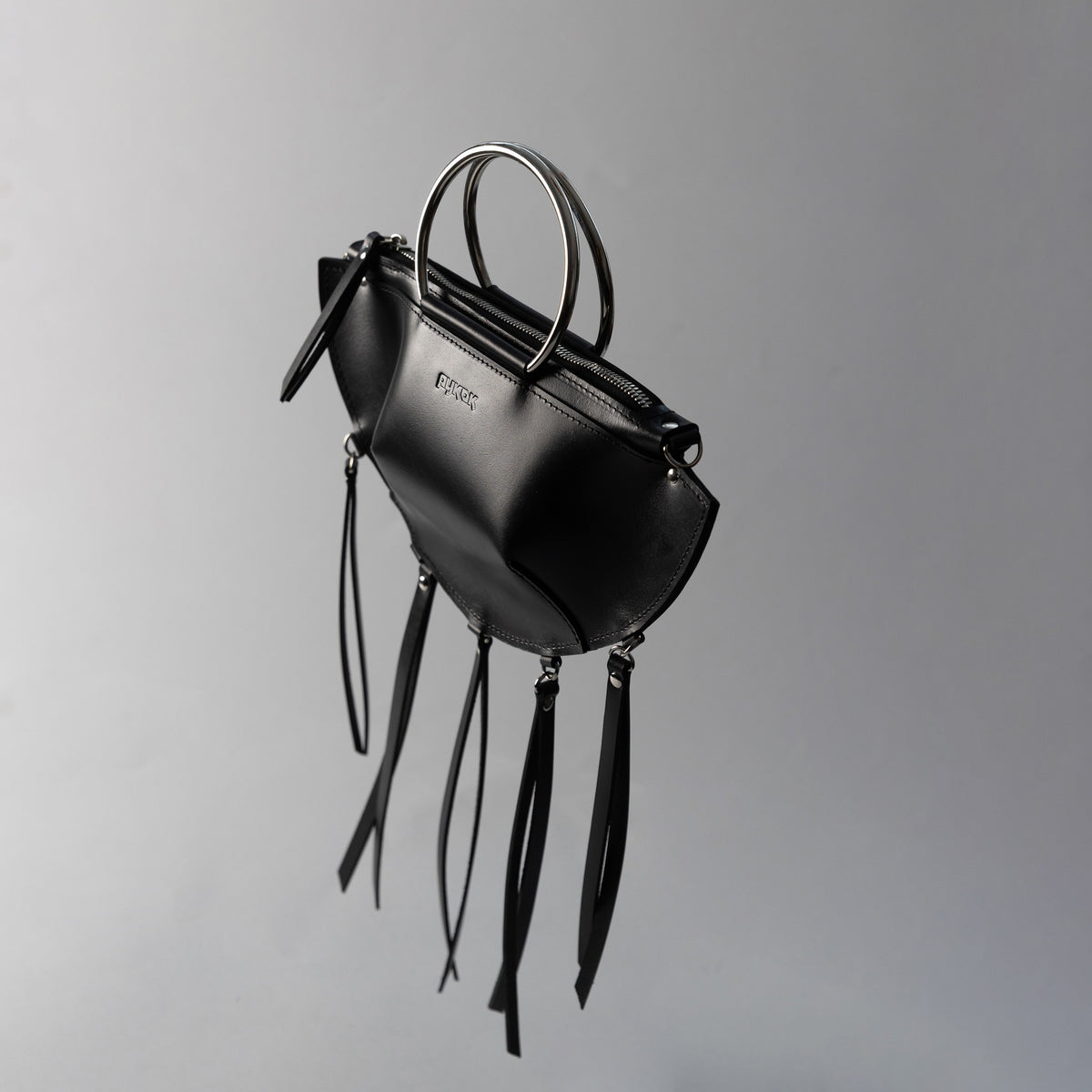 PYKOK KAYA minimalist natural leather bag with metal ring details — view 4